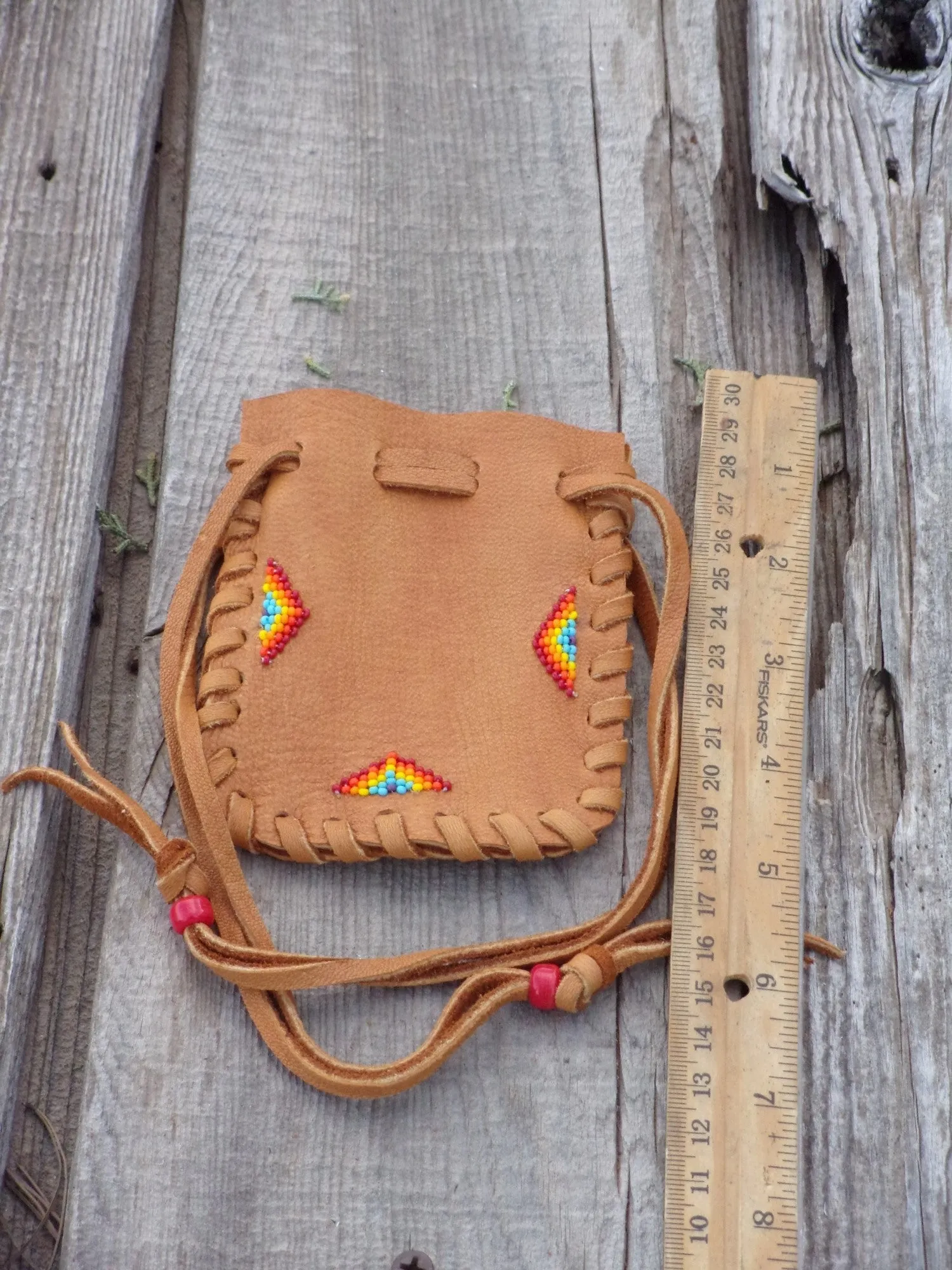 Beaded leather pouch , drawstring medicine bag