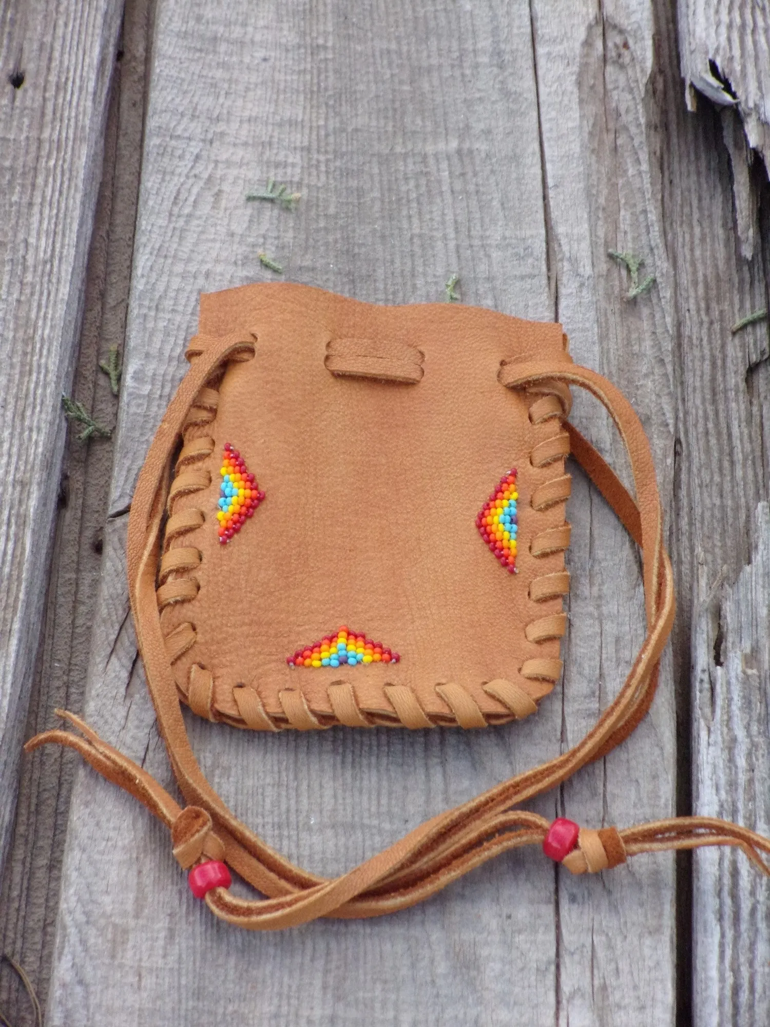 Beaded leather pouch , drawstring medicine bag