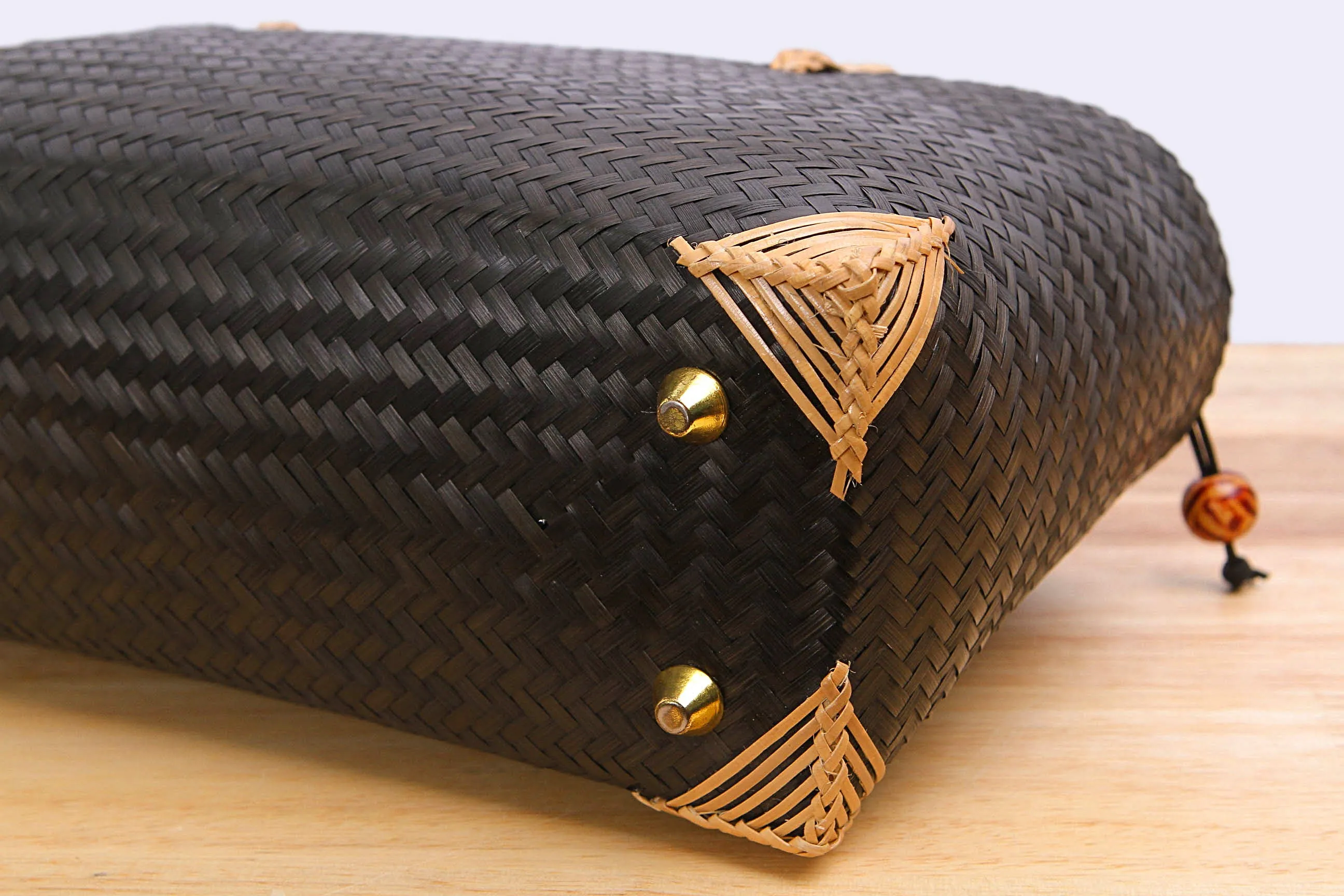 Woven bamboo handbag